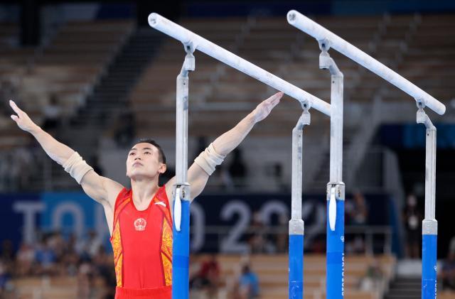 华体会官网-邹敬园双杠决战无敌夺冠 体操队巴黎争金还看他？